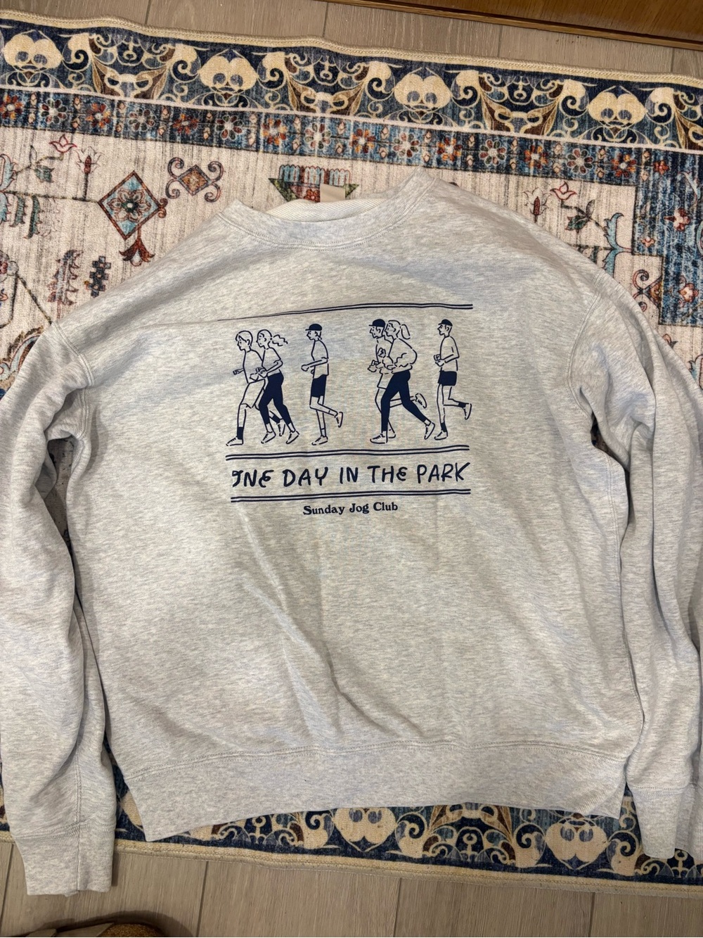 Uniqlo Gray Crewneck Sweatshirt with Navy Jogging Graphic